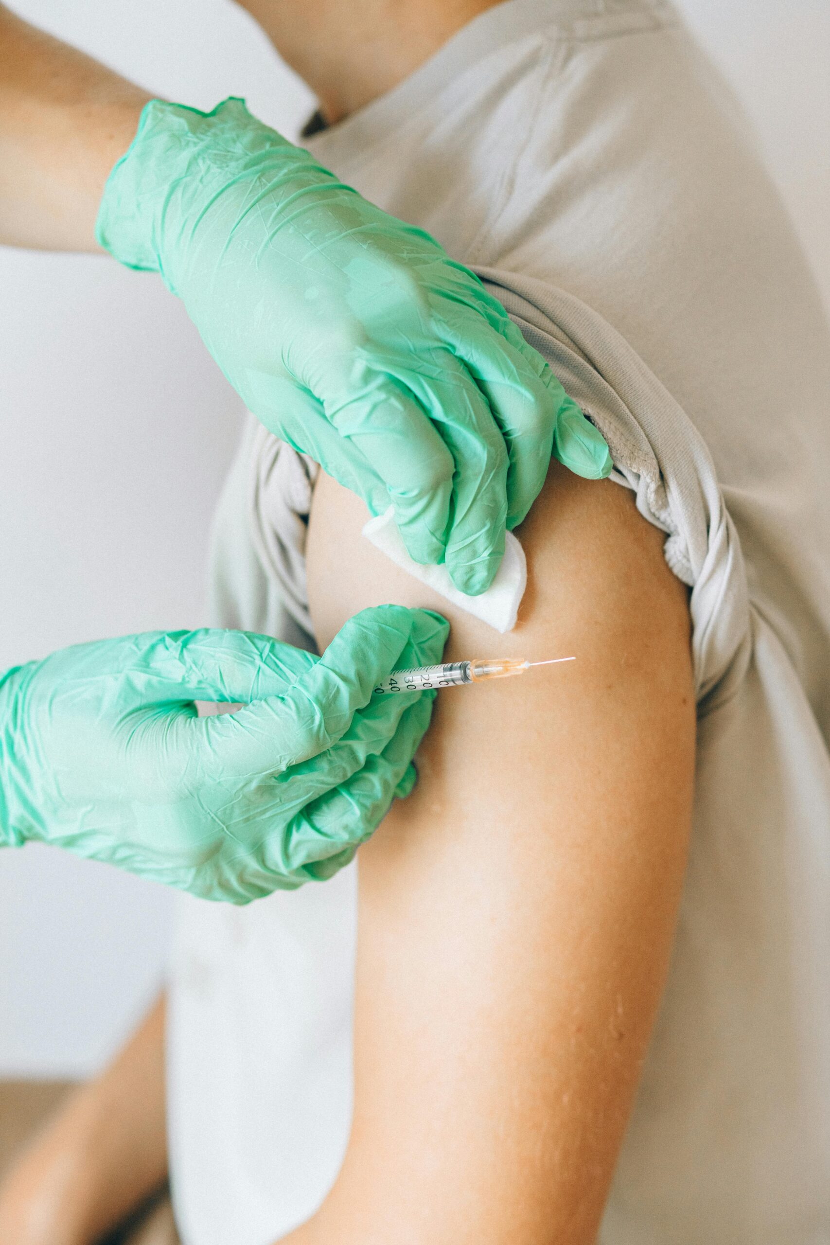 a guy giving an injection