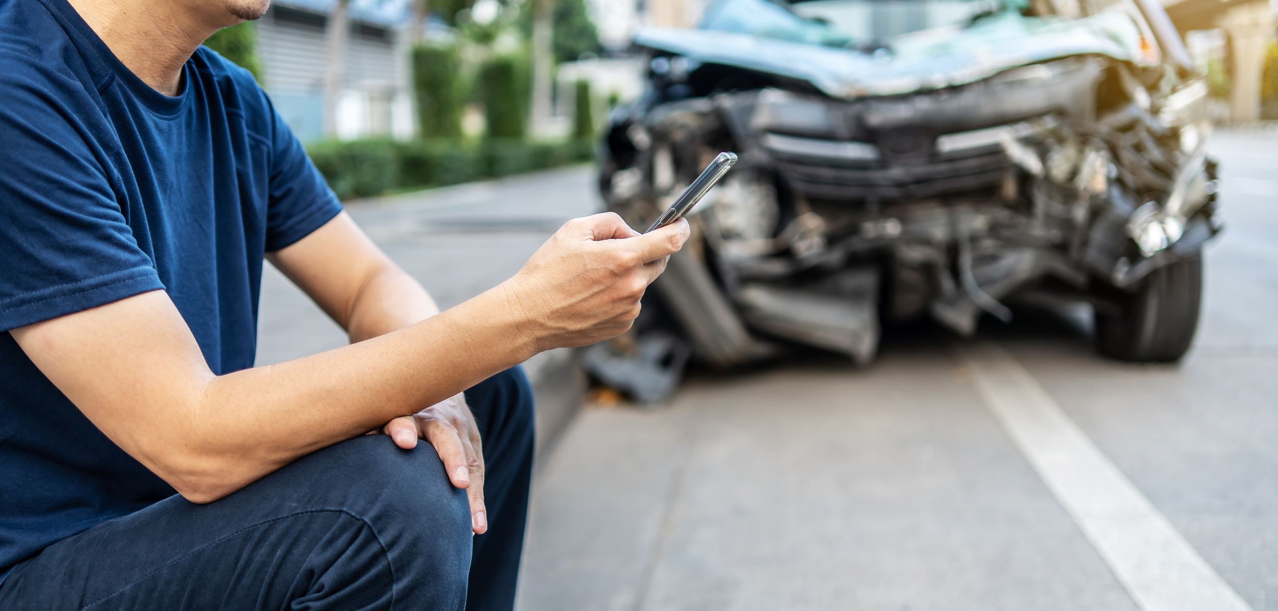 Man calling with phone to his insurance