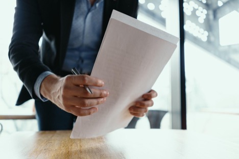 lawyer with workers compensation documents